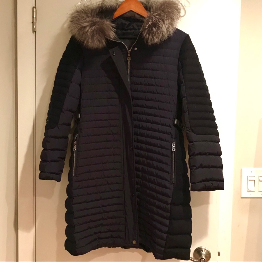 Navy puffy coat with hoodie trimmed with real fur